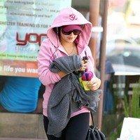 Vanessa Hudgens with her hood up over her cap